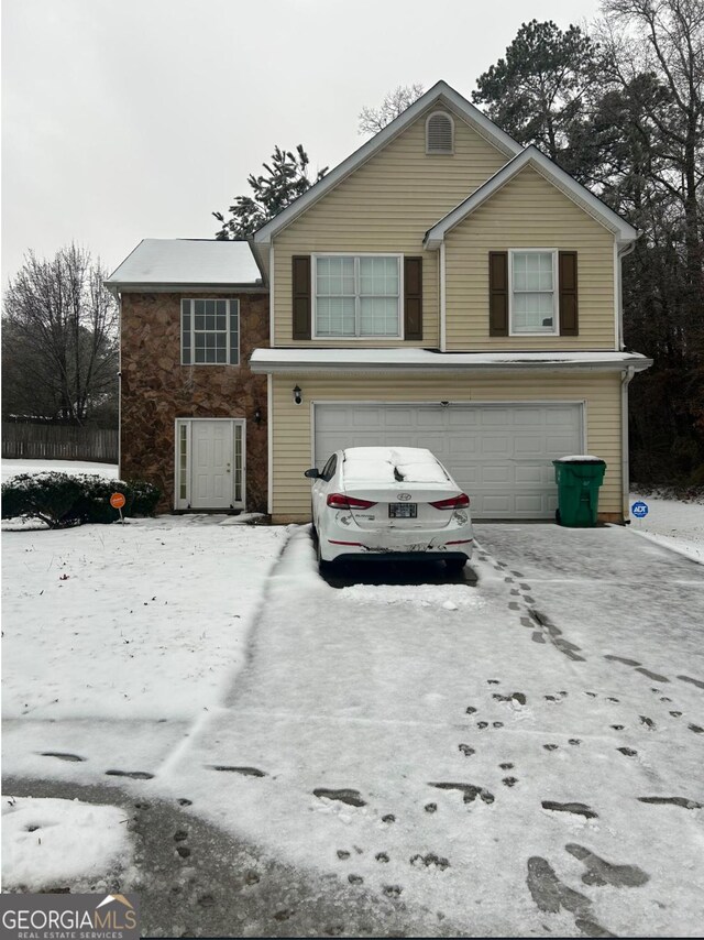 front facade with a garage