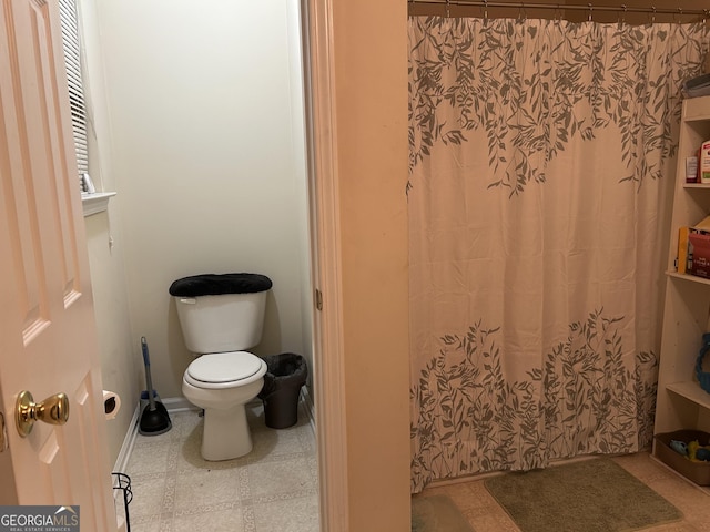 bathroom featuring toilet