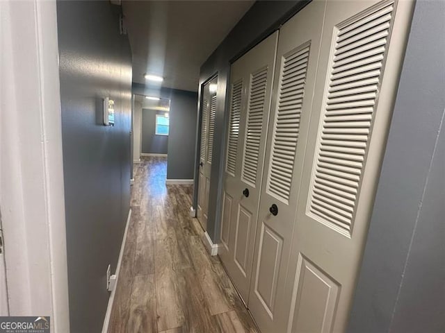 hallway featuring hardwood / wood-style floors