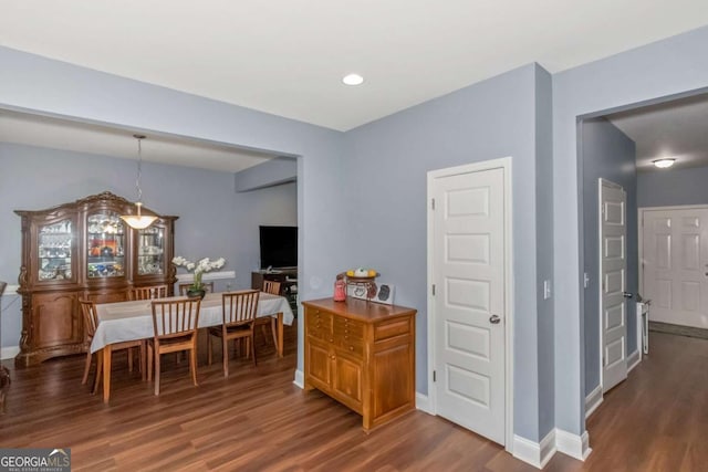 dining room featuring dark hardwood / wood-style floors