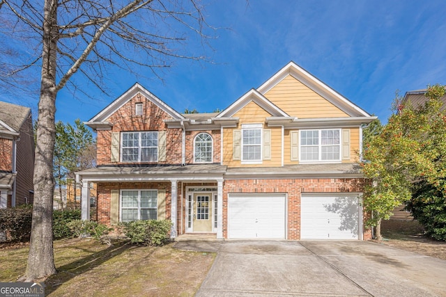 view of front facade with brick siding, concrete driveway, and a garage