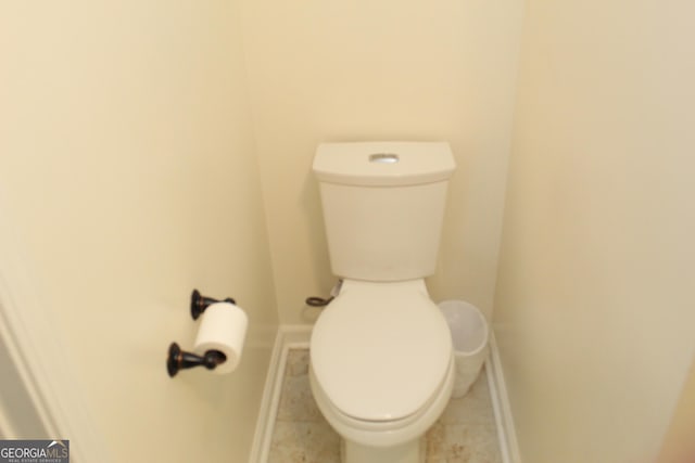 bathroom featuring toilet