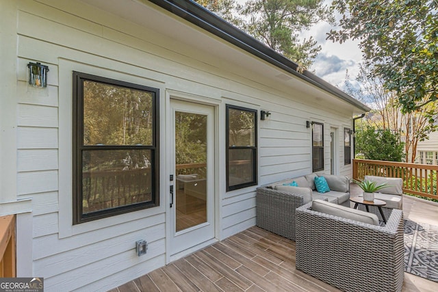 bedroom with access to outside and light hardwood / wood-style flooring