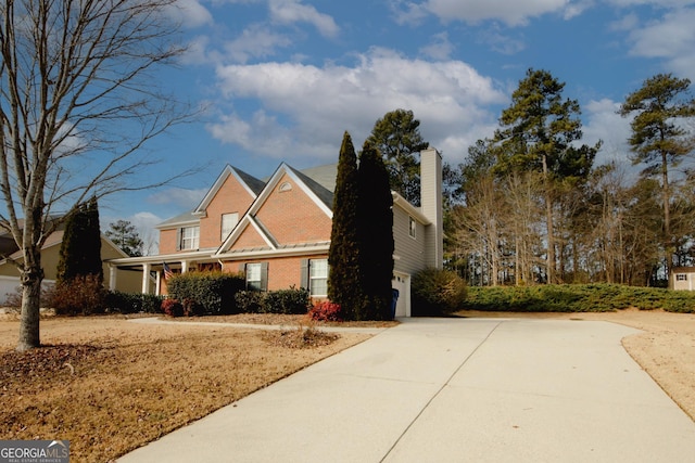 view of front of property with a garage