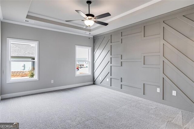 unfurnished living room featuring lofted ceiling, a healthy amount of sunlight, a premium fireplace, and ceiling fan