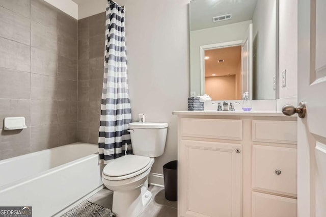 full bathroom featuring tile patterned floors, vanity, toilet, and shower / bathtub combination with curtain