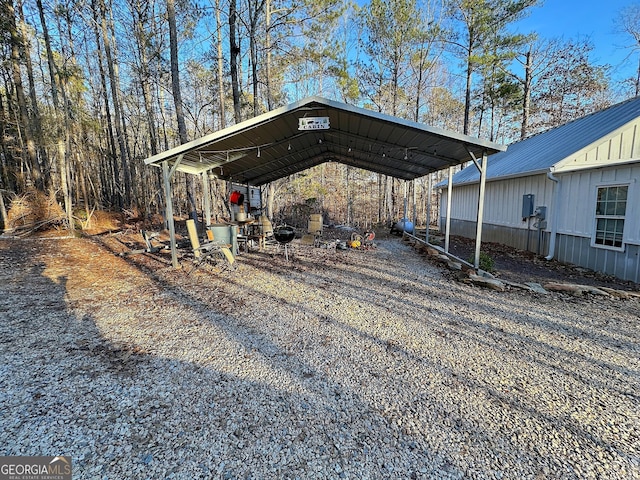 view of car parking featuring a carport