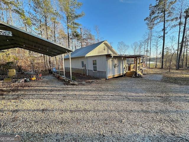 view of property exterior with a carport