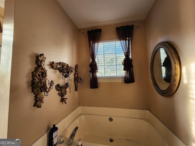 bathroom featuring a bath