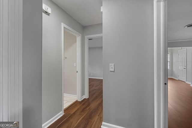 hall featuring dark hardwood / wood-style floors