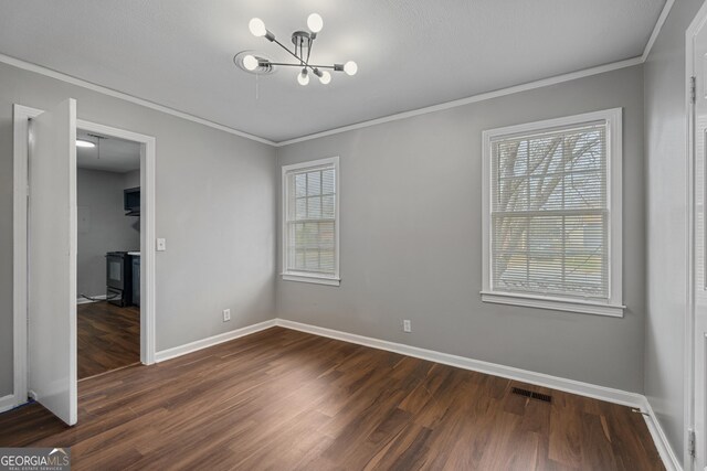 spare room with crown molding and light wood-type flooring