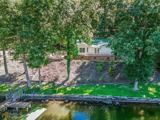 bird's eye view with a water view