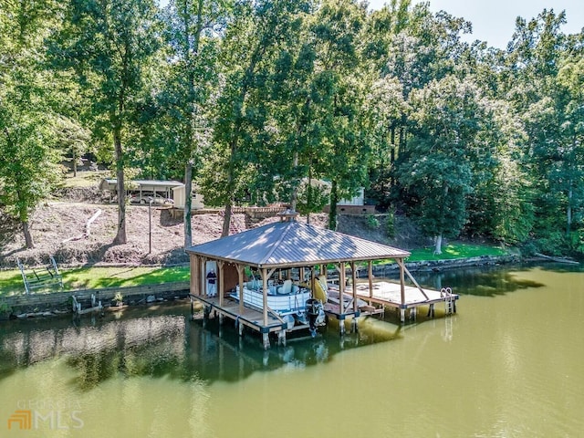 dock area with a water view