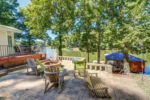 rear view of property with a yard and a patio area