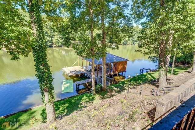 deck featuring a water view