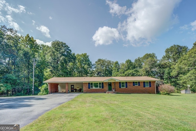 ranch-style house with a carport and a front yard