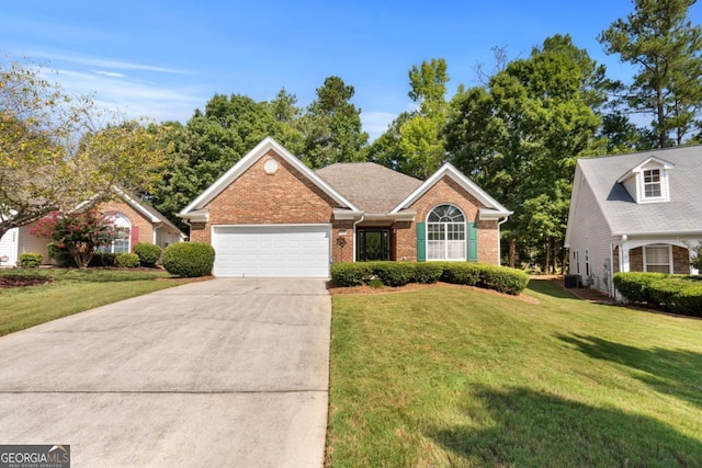 view of front of house featuring a front lawn and a garage