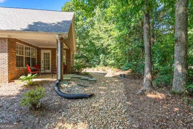 view of yard featuring a patio area