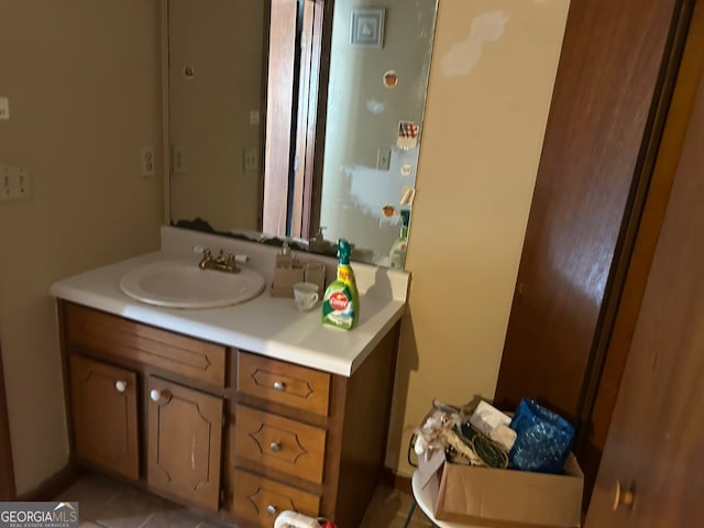 bathroom featuring tile patterned floors and vanity