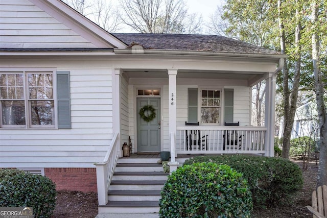 entrance to property with a porch