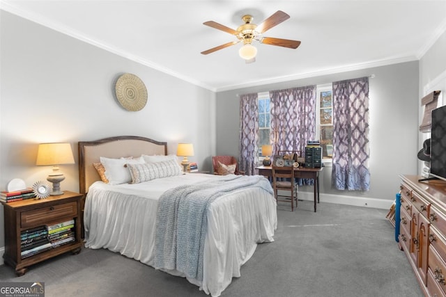 carpeted bedroom featuring ceiling fan and ornamental molding