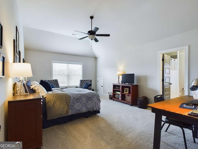 bedroom featuring carpet flooring, vaulted ceiling, and ceiling fan