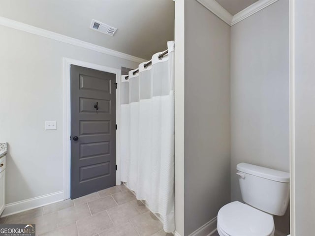 bathroom with a shower with curtain, toilet, vanity, and ornamental molding