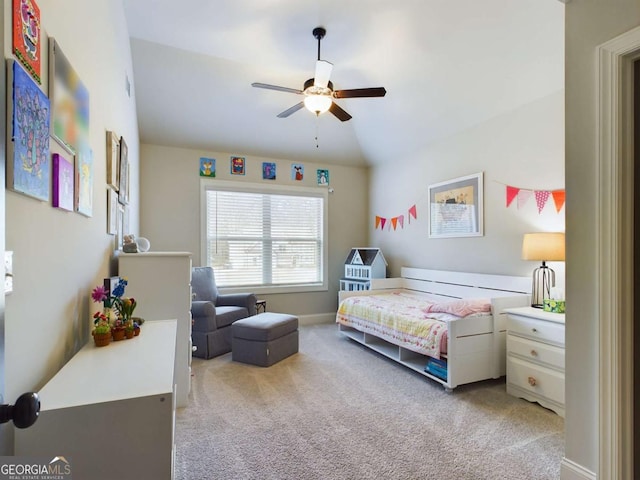 bedroom featuring ceiling fan, light carpet, and vaulted ceiling