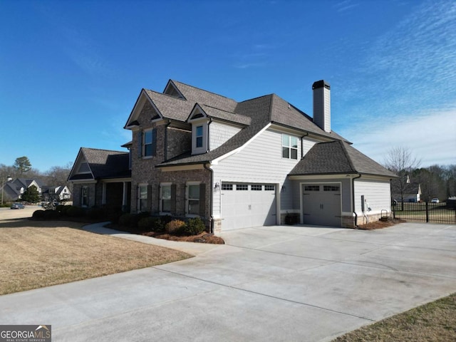 view of side of property featuring a garage