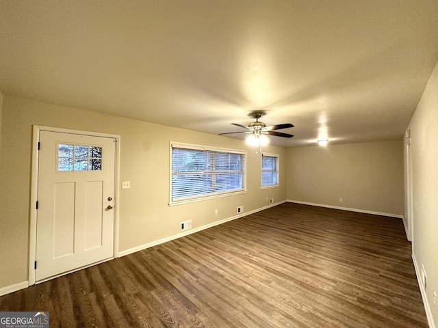 entryway featuring ceiling fan and dark hardwood / wood-style floors