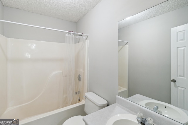 full bathroom with toilet, shower / tub combo, a textured ceiling, and vanity