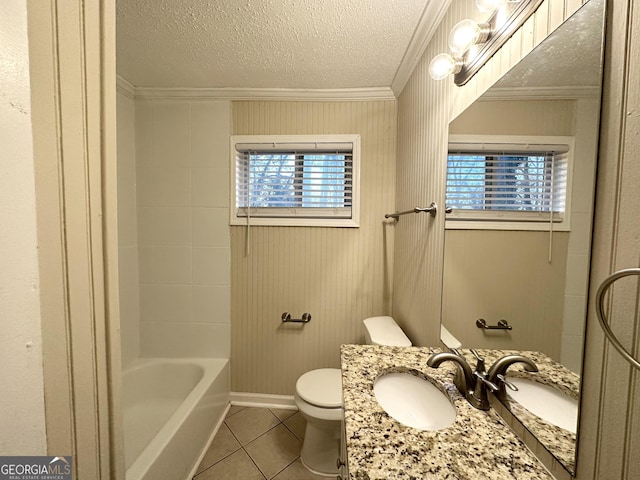 full bathroom with tile patterned floors, a wealth of natural light, a textured ceiling, and toilet