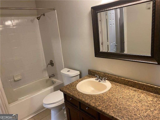 full bathroom featuring tile patterned flooring, vanity, toilet, and shower / bath combination