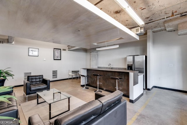 living room featuring sink