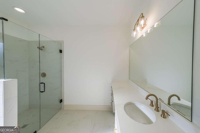 bathroom with vanity and an enclosed shower