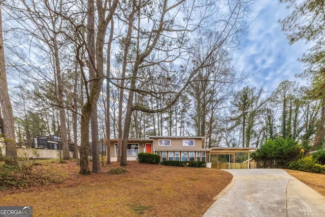 view of front of house featuring a carport