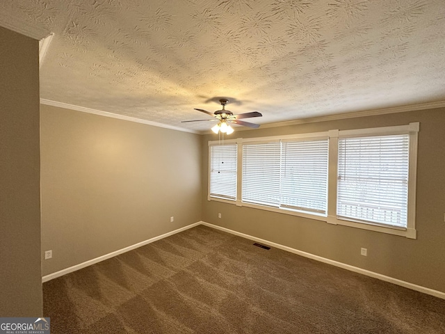 carpeted spare room with ceiling fan, a textured ceiling, and ornamental molding