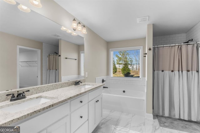 bathroom with vanity and plus walk in shower