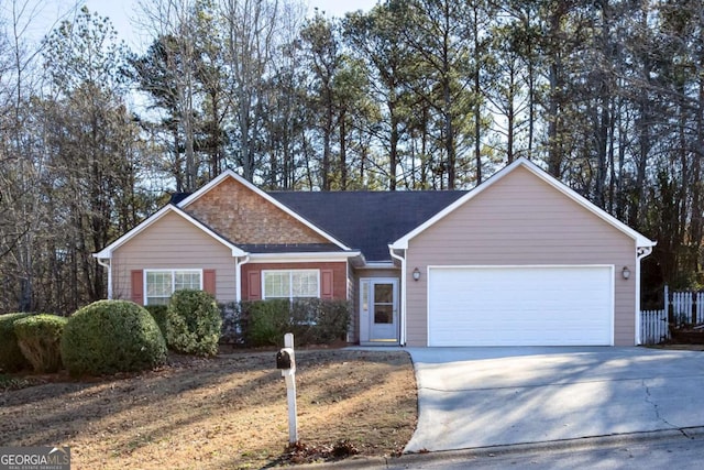 single story home with a garage