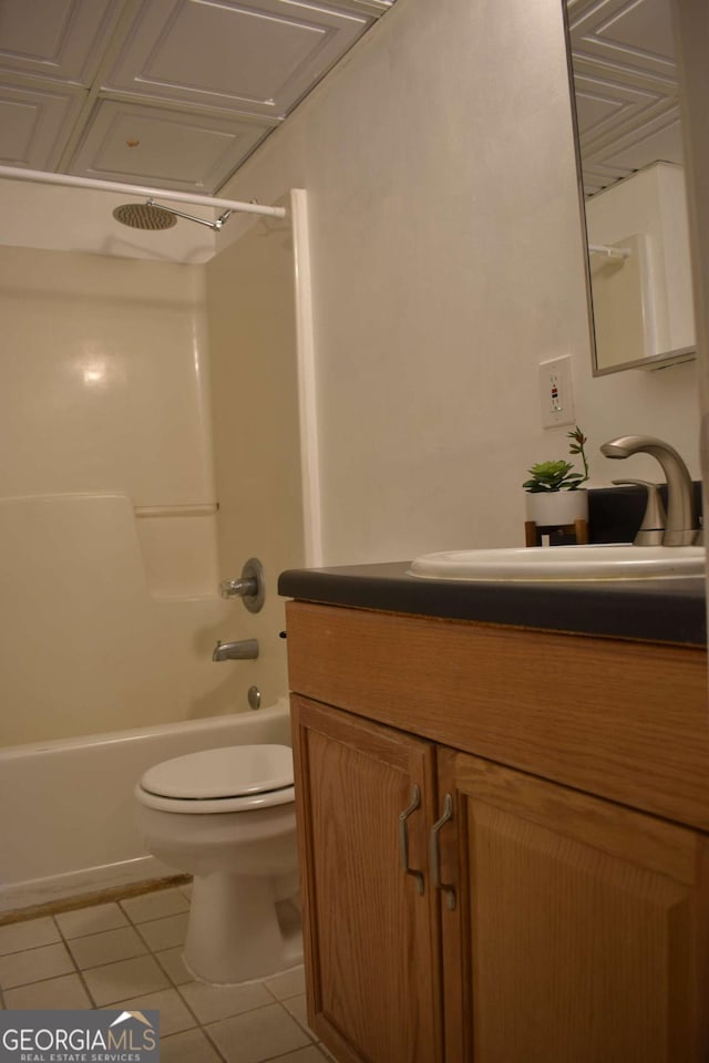 full bathroom featuring tile patterned floors, vanity, toilet, and shower / bathing tub combination