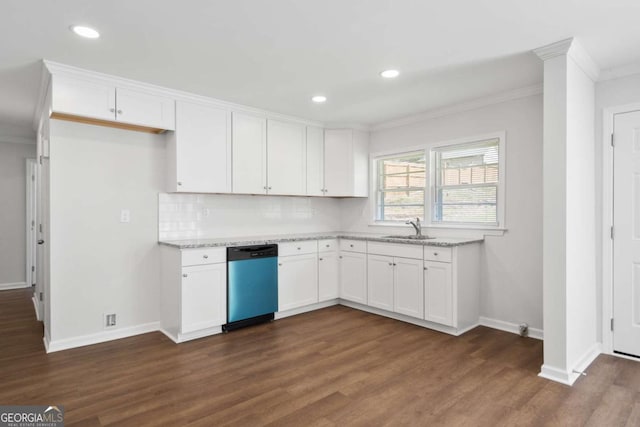 kitchen featuring light stone countertops, dishwasher, white cabinets, and sink