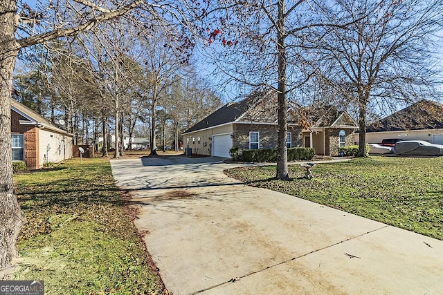 exterior space featuring a front lawn and a garage