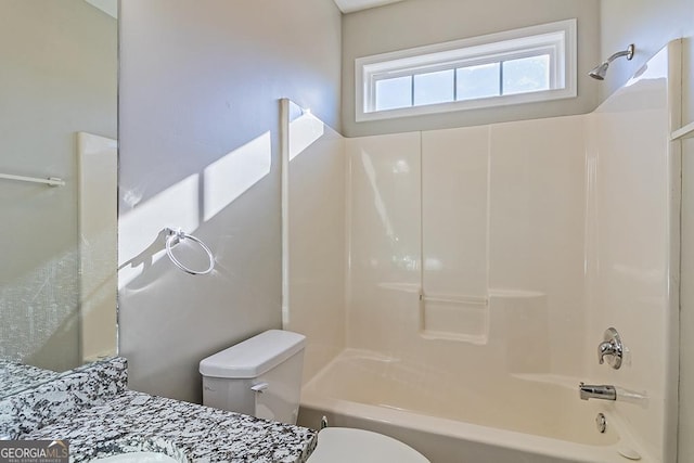 full bathroom featuring vanity, toilet, and shower / bathtub combination