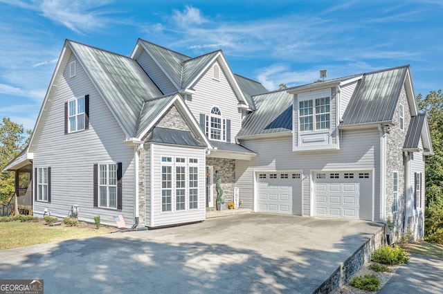 view of front of property featuring a garage