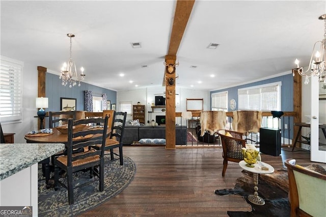 dining room with beamed ceiling, dark hardwood / wood-style floors, and a notable chandelier