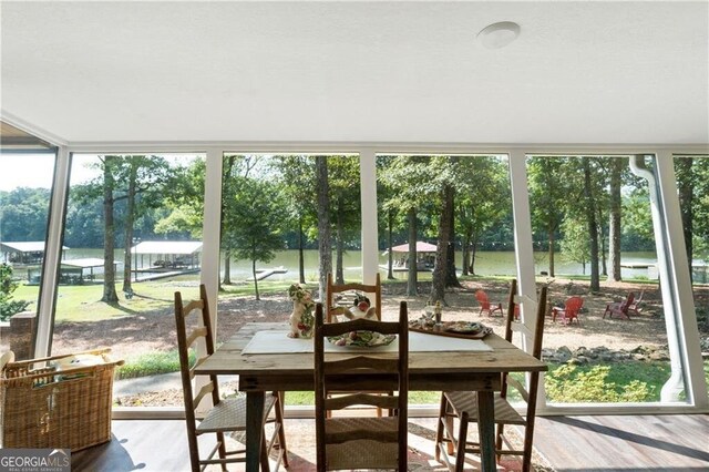 sunroom with a water view