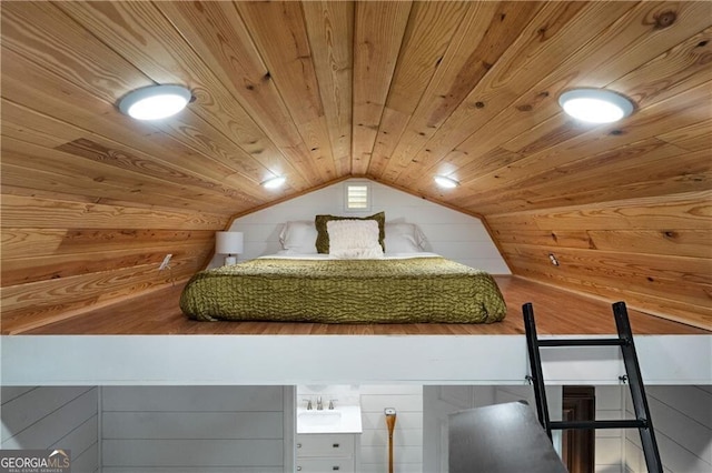 bedroom featuring lofted ceiling, wooden ceiling, and wood walls