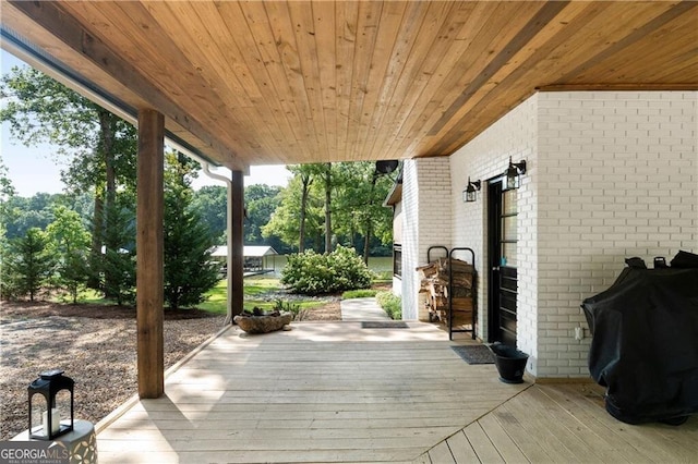 wooden deck with area for grilling