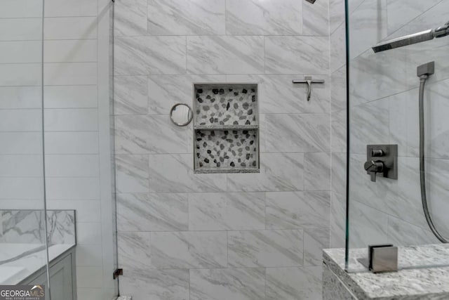 bathroom featuring an enclosed shower