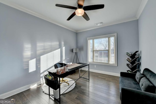 office area featuring ornamental molding, ceiling fan, and dark wood-type flooring